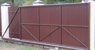 Купить откатные ворота из профнастила Ярославль, цена от 1782 руб.